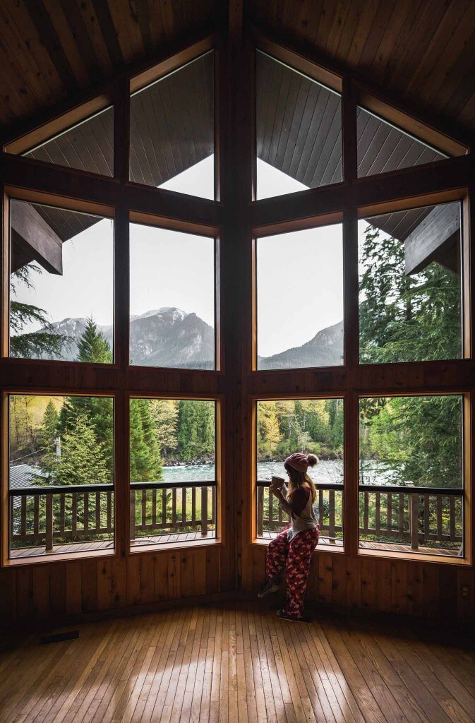 A frame cabin big window by the river in gold bar washington